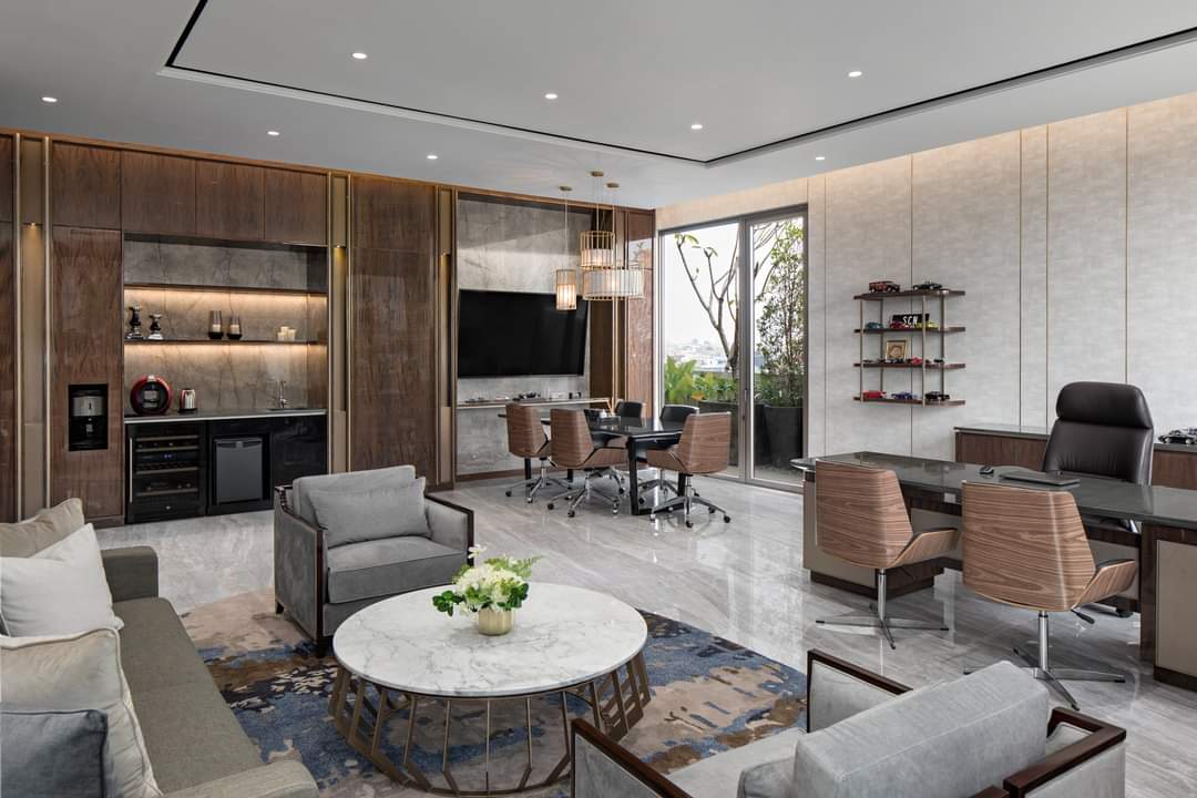 Design Interior Modern Livingroom mewah luxury residence di Pantai Indah Kapuk - Jakarta Utara sofa custom meja bundar solid surface cabinet hpl wood